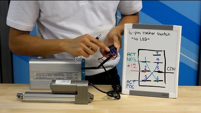 Physical wiring of a rocker switch to an actuator